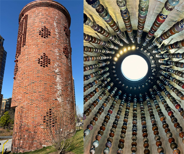 Red brick cylindrical structure by title “Queen City” by Artist Nekisha Durrett in Arlington, Virginia  
